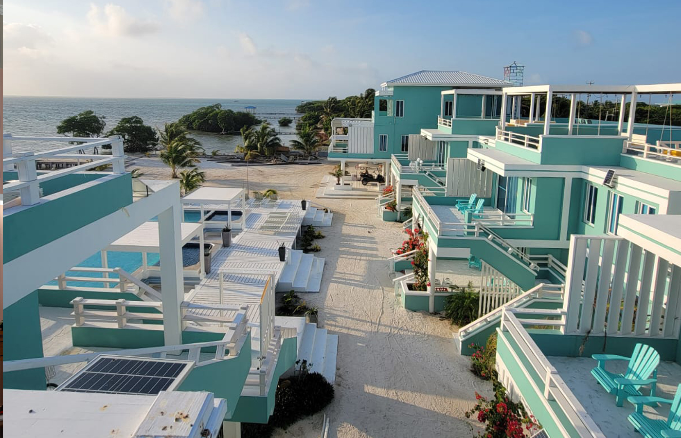 The villa compound, pool and sea view at Island Magic Villas